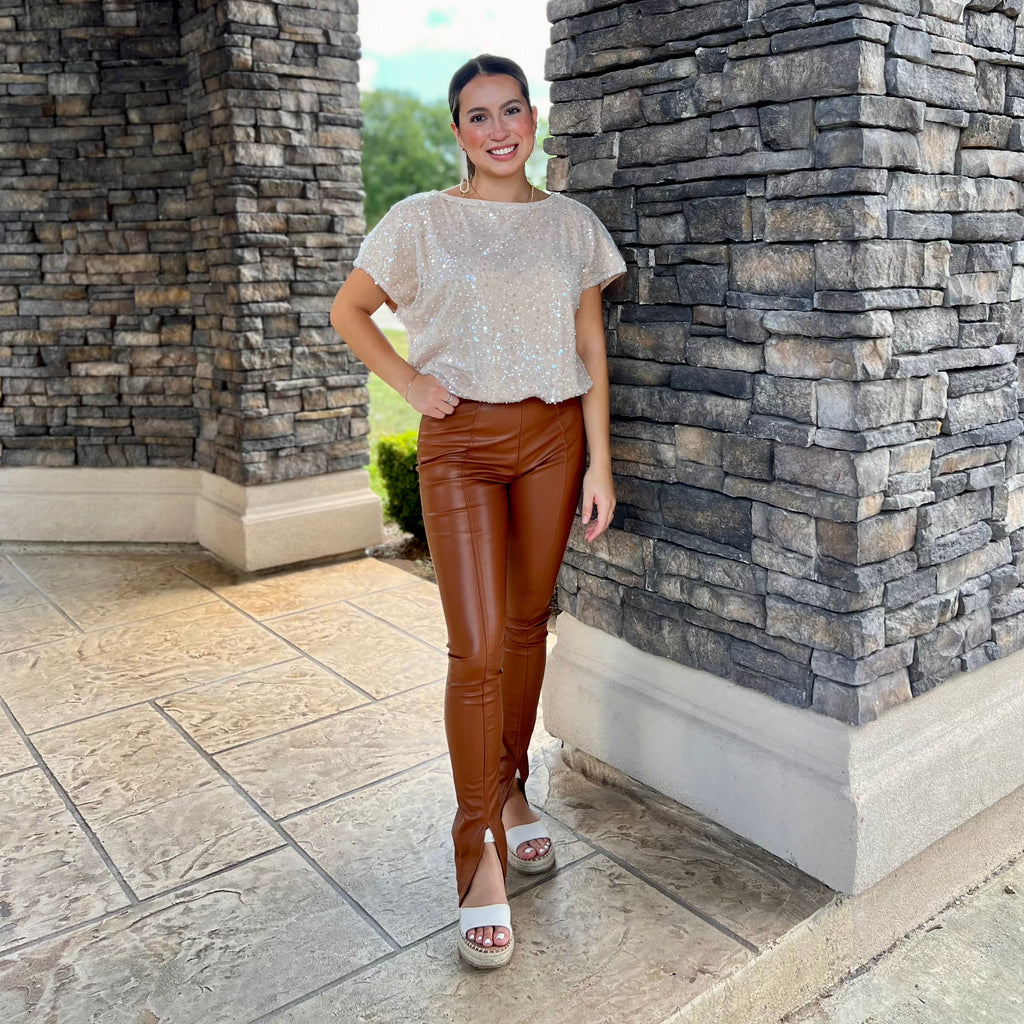 Chestnut Faux Leather Pull on Pants with a front seam and slit. 