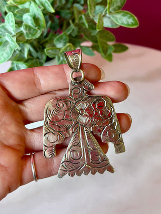 Pink Conch Silver Thunderbird Silver Pendant